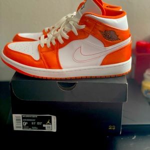 Mens 9.5 Air Jordan 1 Mid SE, Electro orange/black and white, lightly worn.